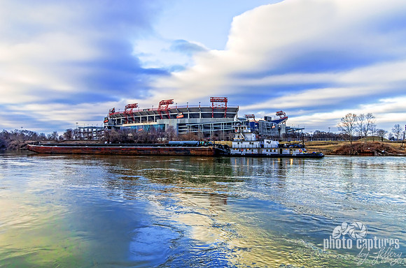 Tug Boat Moving Quickly Cumberland River In Front Of LP Field Nashville TN