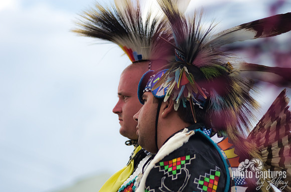 Two Native American male dancers walking the circle Mt Juliet Powwow