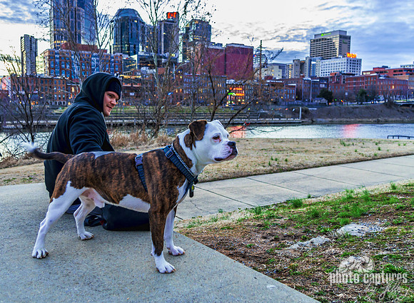 Man and Best Friend On The East Bank