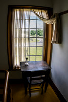 Lamp On Desk In Front of Window