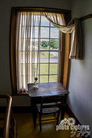 Lamp On Desk In Front of Window