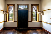 Two Windows Dark Painted Door Inside Centre House Domitory