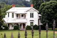Someone in Window Historic Queen Anne style 1902