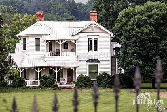 Someone in Window Historic Queen Anne style 1902