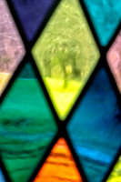 Looking outside Through Colorful Stained Glass