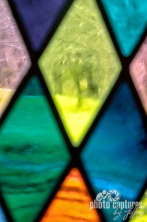 Looking outside Through Colorful Stained Glass