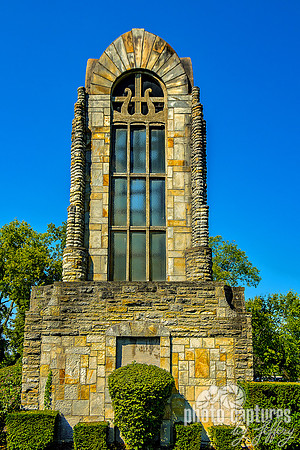Commemorative stone tower Against Blue Sky Close Center