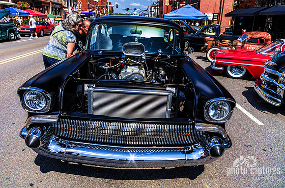 Ma and Pa Checking Out Classic Car