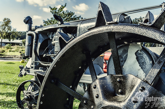 Black Spiked Steel Wheel Tractor