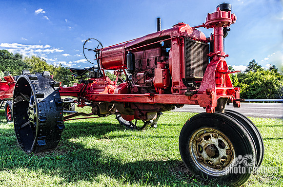 Antique Tractor With Blue Sky