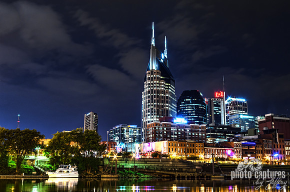 Boat On The Riverfront With Nashville Skyline In Background
