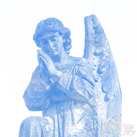 Kneeling blue male angelic winged sculpture