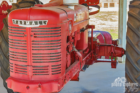 Classic red Farmall tractor displayed at Ellington Agricultural Center