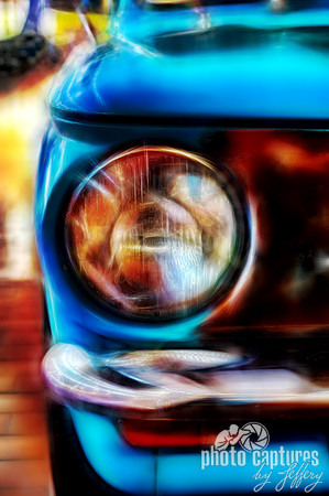 Painterly rendering of blue front view auto