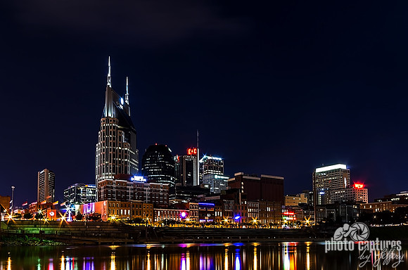 Bright neon lights late evening Nashville Skyline Riverfront