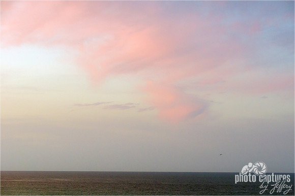 Calming Morning Soft Pink Clouds Over Ocean