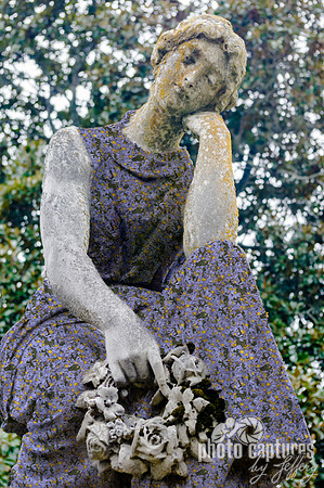 Female sculpture floral dress Maplewood Cemetery