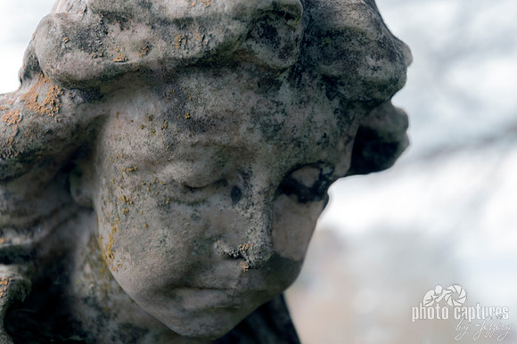 Little female sculpture Maplewood Cemetery landscape view