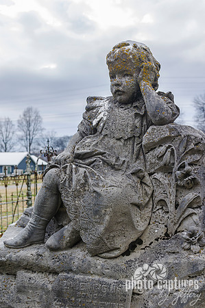 Sad little girl sculpture Maplewood Cemetery Pulaski TN