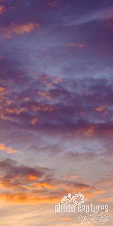 Puffs of sunset clouds 2nd left