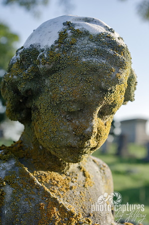 Little one child sculpture Elmwood Cemetery