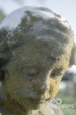 Close portrait child sculpture Elmwood Cemetery