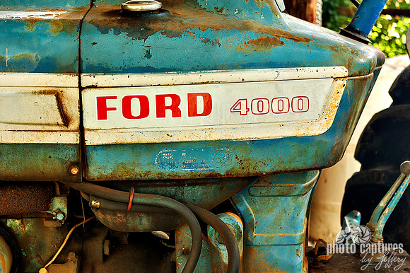 Close view old blue tractor