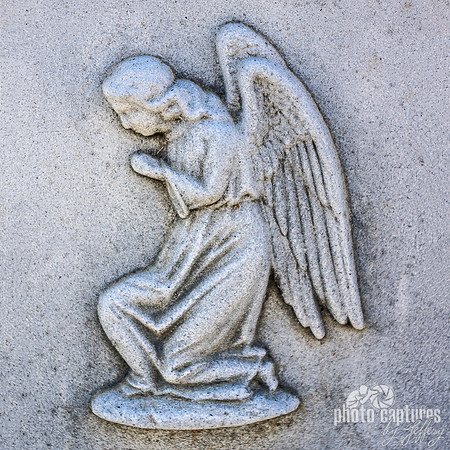 Kneeling winged angel emblem square