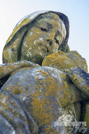 Queen Fuqua female sculpture with child in arms