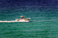 Fishing Boat Across The Ocean