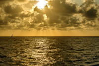 Evening Golden Light Over Vast Ocean
