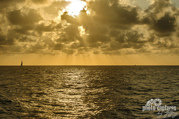 Evening Golden Light Over Vast Ocean