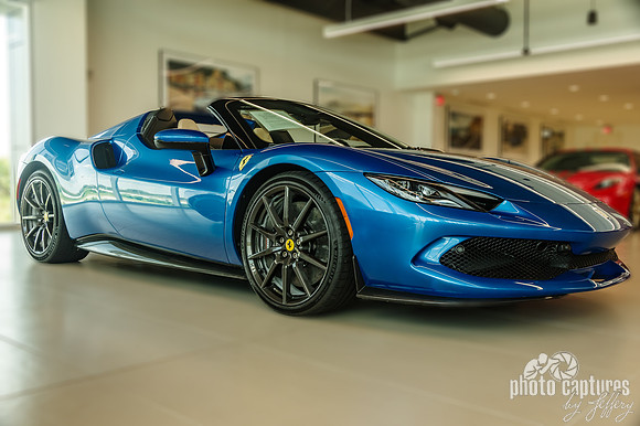 Blue Ferrari Passanger Front View