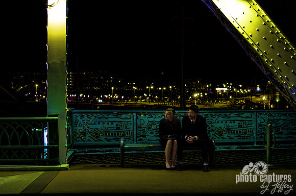 Elegant couple on date night on John Seigenthaler Pedestrian Bridge