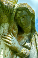 Female Sculpture Hand on Cross