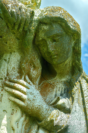 Female Sculpture Hand on Cross
