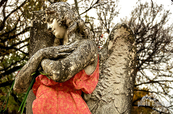 Elegant female angel wearing patterned dress