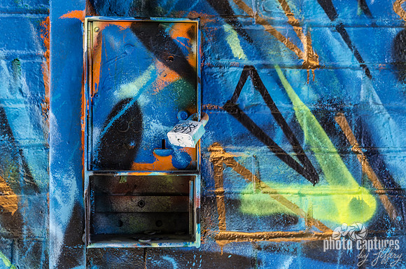 Graffiti covered locked box