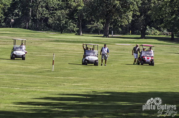 Golfer standing outside golf cart West Nashville golf course