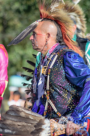 Colorful attire on senior male dancer NAIA Powwow