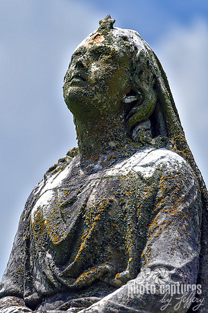 Female Sculpture Hands Resting on Anchor portrait