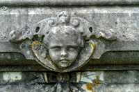 Head Carved In Stone Monument