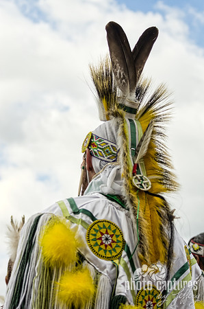 Brightly yellow male dancer Mount Juliet Powwow